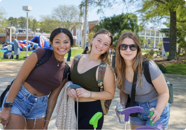 three girls smiling